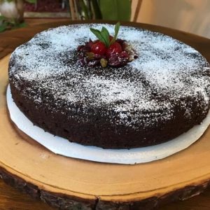 Moist Jamaican black cake rich fruit cake infused with black rum sweet wine and molasses deep flavored traditional Caribbean bakery dessert cake
