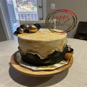 Dulce de leche cake layered with homemade caramel sauce Caribbean vanilla and rich caramel buttercream creamy bakery style dessert
